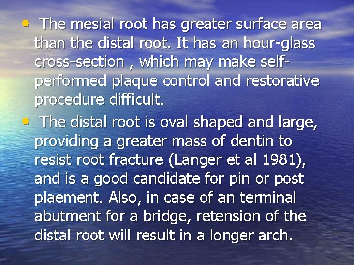 • The mesial root has greater surface area than the distal root. It • The mesial root has greater surface area than the distal root. It