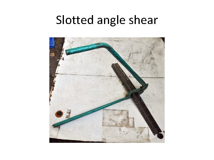 Slotted angle shear 