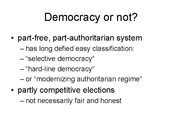 Democracy or not? • part-free, part-authoritarian system – has long defied easy classification: –