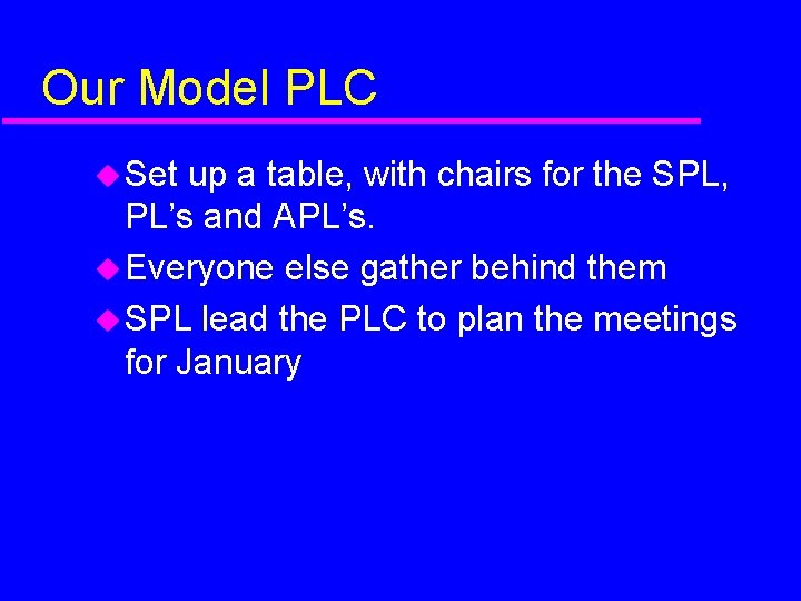 Our Model PLC Set up a table, with chairs for the SPL, PL’s and