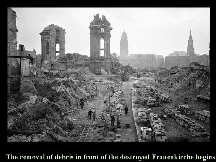 The removal of debris in front of the destroyed Frauenkirche begins 