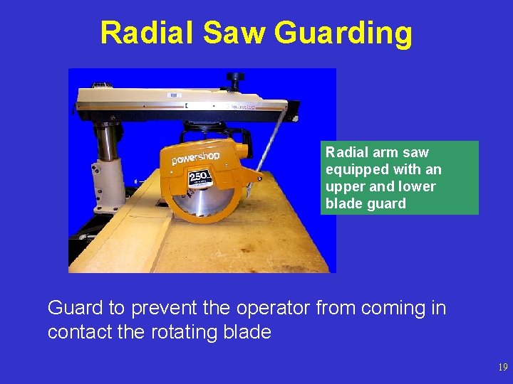 Radial Saw Guarding Radial arm saw equipped with an upper and lower blade guard