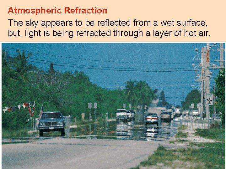 Atmospheric Refraction The sky appears to be reflected from a wet surface, but, light