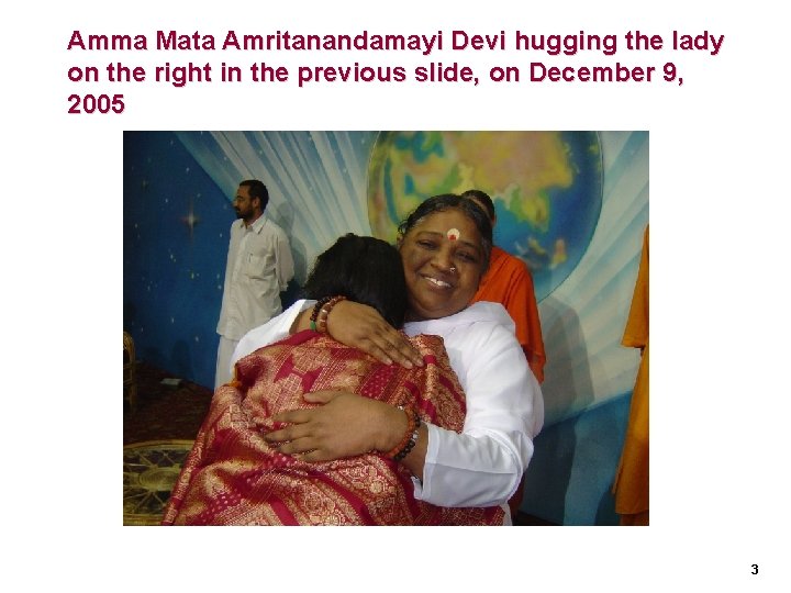 Amma Mata Amritanandamayi Devi hugging the lady on the right in the previous slide,