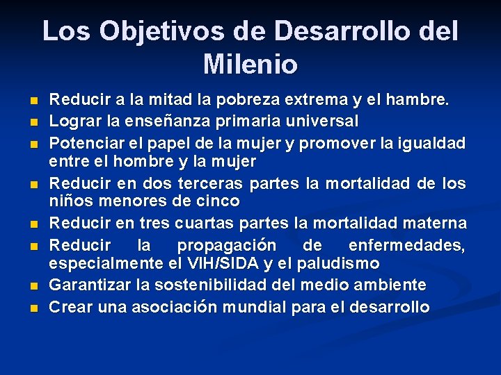 Los Objetivos de Desarrollo del Milenio n n n n Reducir a la mitad