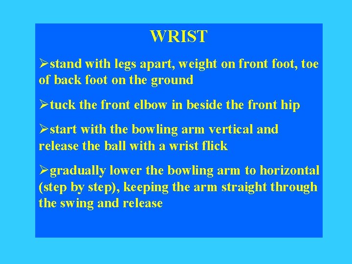 WRIST Østand with legs apart, weight on front foot, toe of back foot on