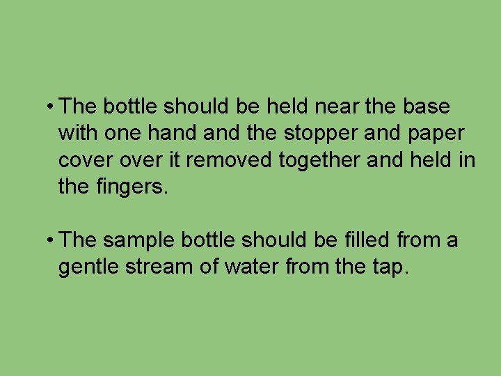  • The bottle should be held near the base with one hand the