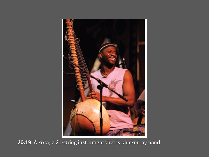 20. 19 A kora, a 21 -string instrument that is plucked by hand 