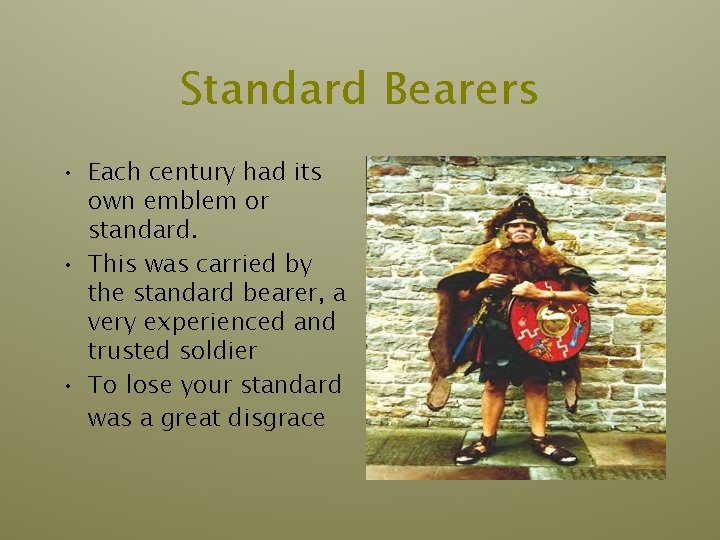Standard Bearers • Each century had its own emblem or standard. • This was Standard Bearers • Each century had its own emblem or standard. • This was