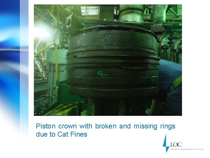 Piston crown with broken and missing rings due to Cat Fines 