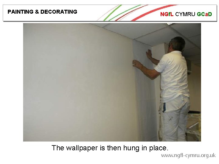 PAINTING & DECORATING NGf. L CYMRU GCa. D The wallpaper is then hung in