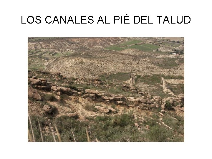 LOS CANALES AL PIÉ DEL TALUD 