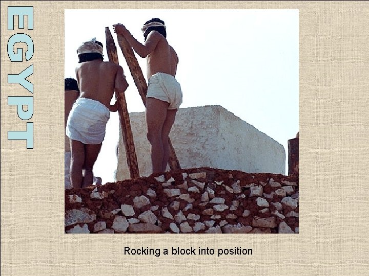 Rocking a block into position Rocking a block into position