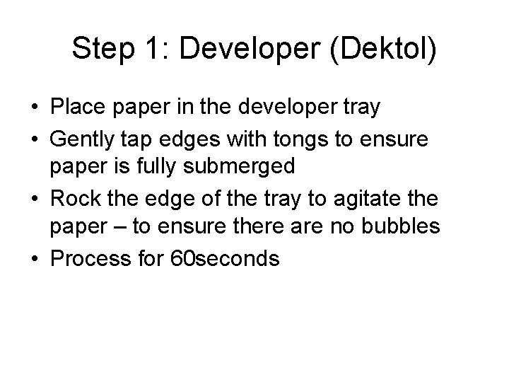 Step 1: Developer (Dektol) • Place paper in the developer tray • Gently tap Step 1: Developer (Dektol) • Place paper in the developer tray • Gently tap
