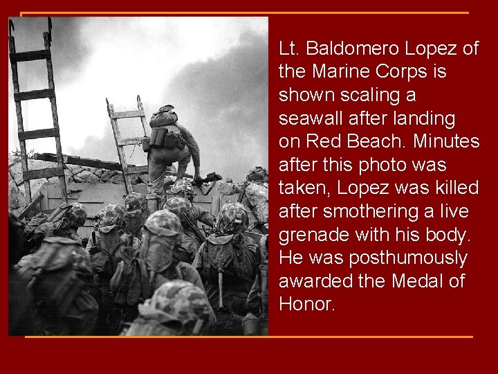 Lt. Baldomero Lopez of the Marine Corps is shown scaling a seawall after landing