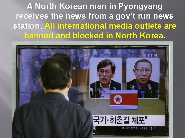 A North Korean man in Pyongyang receives the news from a gov’t run news