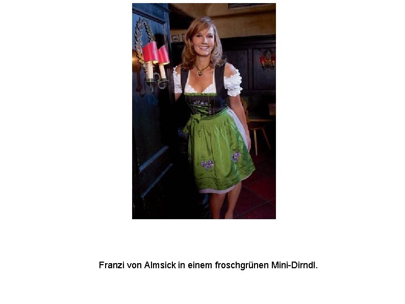 Franzi von Almsick in einem froschgrünen Mini-Dirndl. 