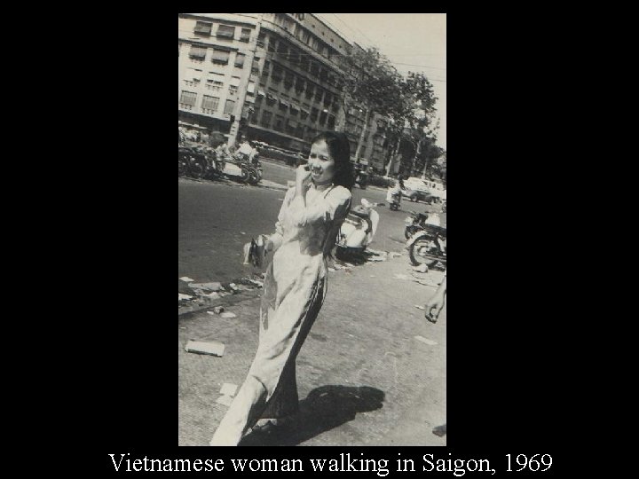 Vietnamese woman walking in Saigon, 1969 