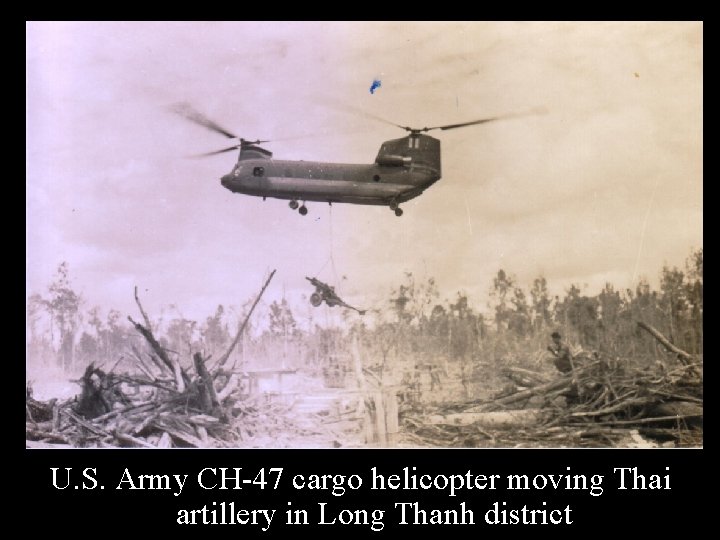 U. S. Army CH-47 cargo helicopter moving Thai artillery in Long Thanh district 