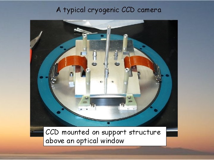 A typical cryogenic CCD camera CCD mounted on support structure above an optical window