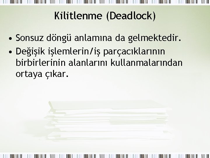 Kilitlenme (Deadlock) • Sonsuz döngü anlamına da gelmektedir. • Değişik işlemlerin/iş parçacıklarının birbirlerinin alanlarını Kilitlenme (Deadlock) • Sonsuz döngü anlamına da gelmektedir. • Değişik işlemlerin/iş parçacıklarının birbirlerinin alanlarını