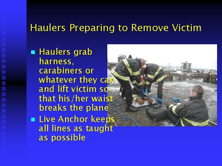 Haulers Preparing to Remove Victim n n Haulers grab harness, carabiners or whatever they