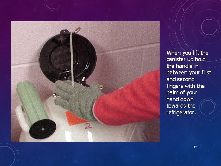 When you lift the canister up hold the handle in between your first and When you lift the canister up hold the handle in between your first and