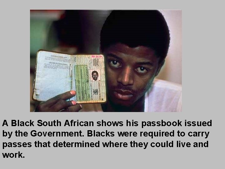 A Black South African shows his passbook issued by the Government. Blacks were required