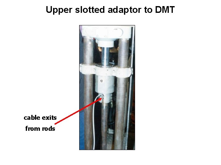 Upper slotted adaptor to DMT cable exits from rods 