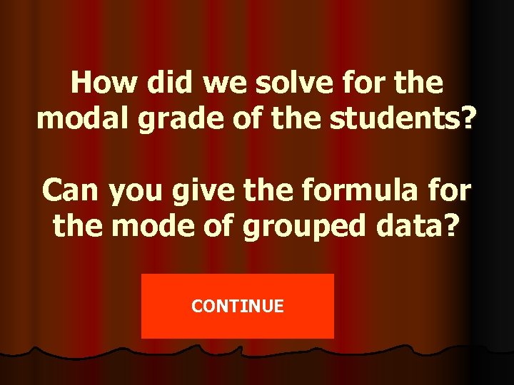 How did we solve for the modal grade of the students? Can you give