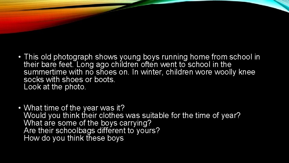  • This old photograph shows young boys running home from school in their