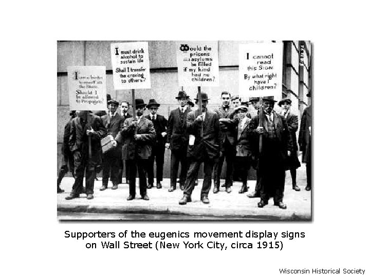 Supporters of the eugenics movement display signs on Wall Street (New York City, circa