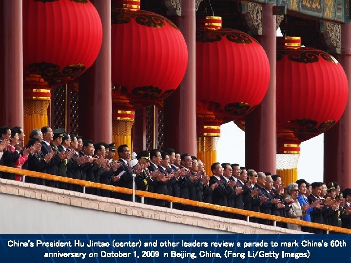 China's President Hu Jintao (center) and other leaders review a parade to mark China's