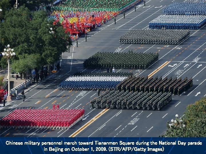 Chinese military personnel march toward Tiananmen Square during the National Day parade in Beijing