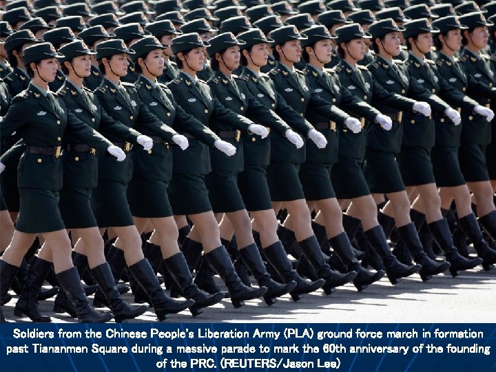 Soldiers from the Chinese People's Liberation Army (PLA) ground force march in formation past
