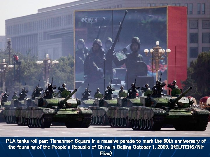 PLA tanks roll past Tiananmen Square in a massive parade to mark the 60