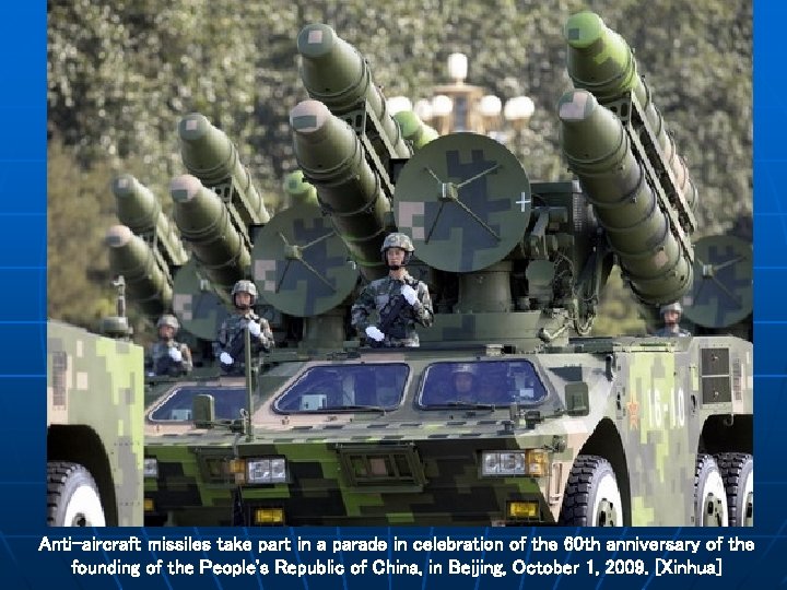 Anti-aircraft missiles take part in a parade in celebration of the 60 th anniversary