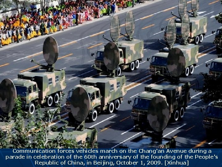 Communication forces vehicles march on the Chang'an Avenue during a parade in celebration of