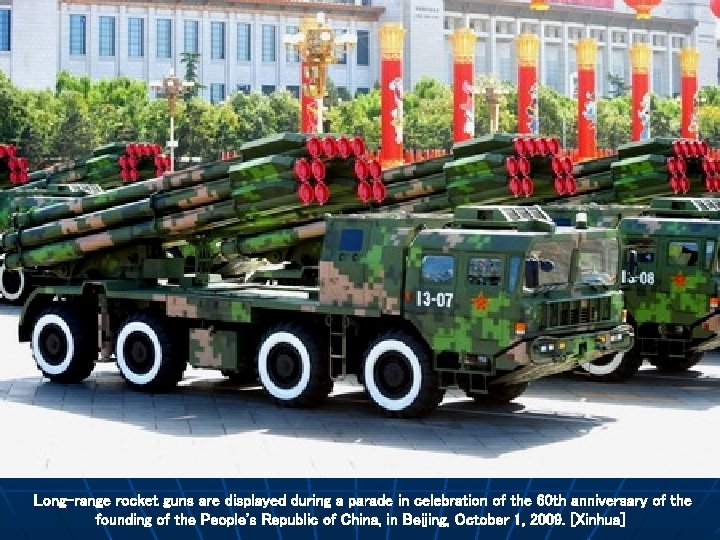 Long-range rocket guns are displayed during a parade in celebration of the 60 th