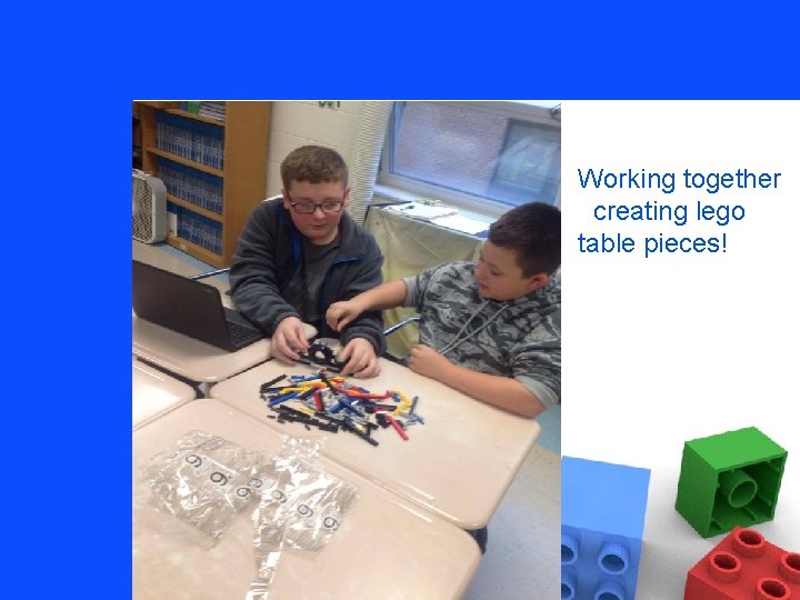 Working together creating lego table pieces! 