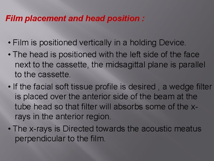 Film placement and head position : • Film is positioned vertically in a holding