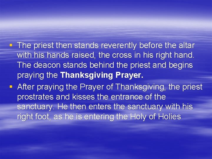 § The priest then stands reverently before the altar with his hands raised, the