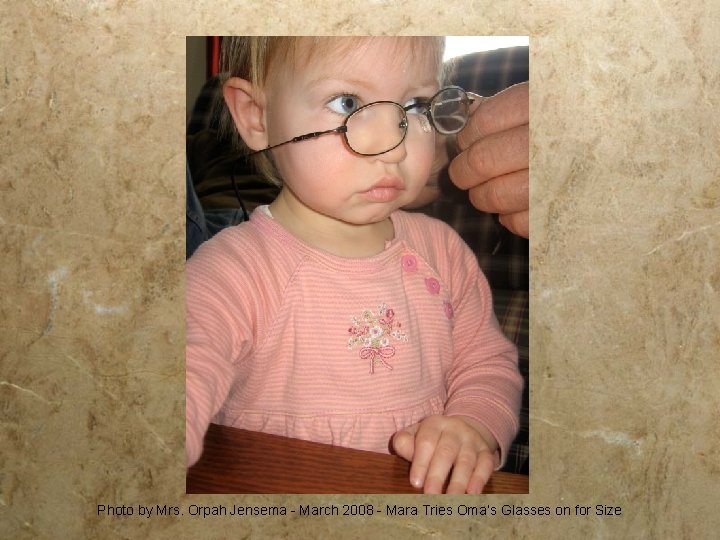 Photo by Mrs. Orpah Jensema - March 2008 - Mara Tries Oma’s Glasses on