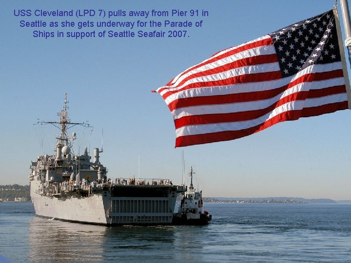 USS Cleveland (LPD 7) pulls away from Pier 91 in Seattle as she gets USS Cleveland (LPD 7) pulls away from Pier 91 in Seattle as she gets