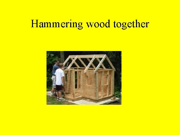 Hammering wood together 