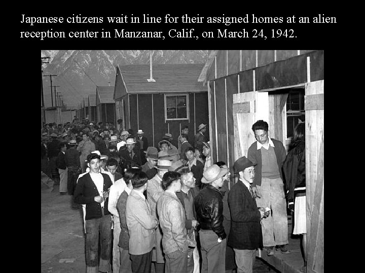 Japanese citizens wait in line for their assigned homes at an alien reception center