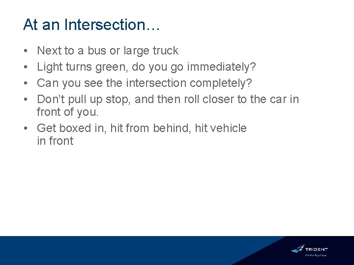 At an Intersection… • • Next to a bus or large truck Light turns