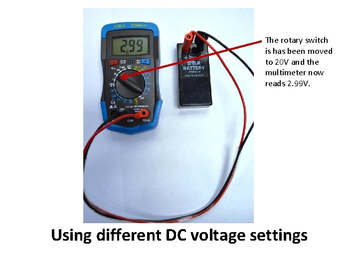 The rotary switch is has been moved to 20 V and the multimeter now