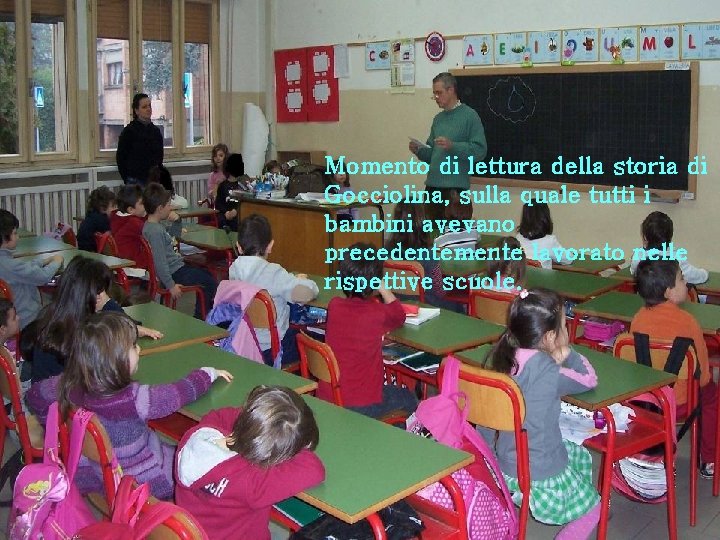 Momento di lettura della storia di Gocciolina, sulla quale tutti i bambini avevano precedentemente Momento di lettura della storia di Gocciolina, sulla quale tutti i bambini avevano precedentemente
