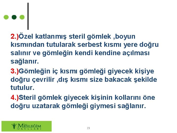 2. )Özel katlanmış steril gömlek , boyun kısmından tutularak serbest kısmı yere doğru salınır